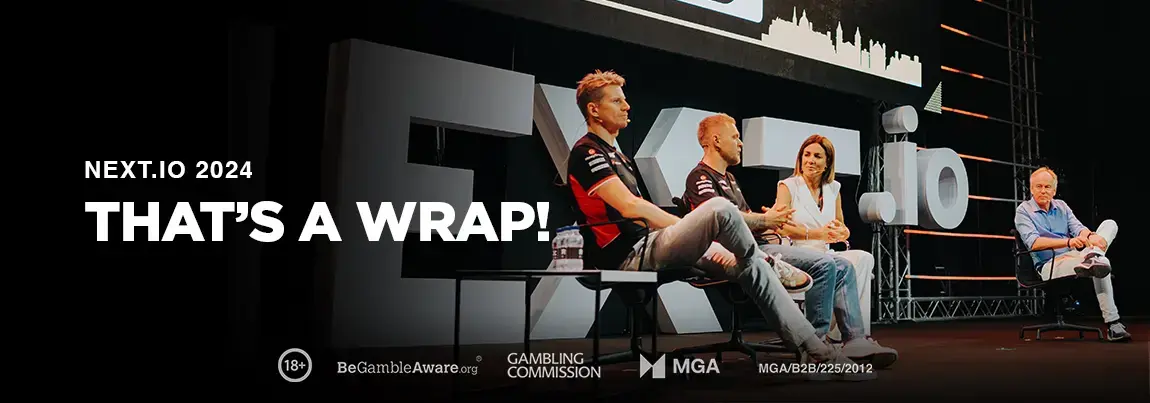 Kevin Magnuessen, Nico Hulkenburg and Natalie Pinkham on a panel at next.io